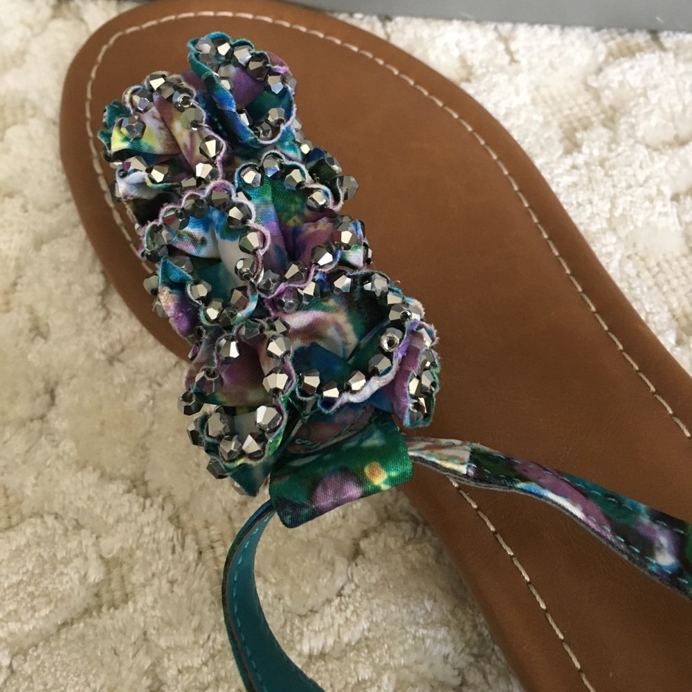 New in box .. multi color sandals